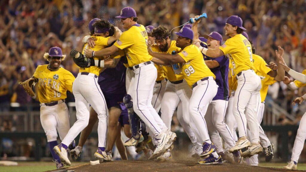 LSU baseball players celebrating in yellow uniforms on the field